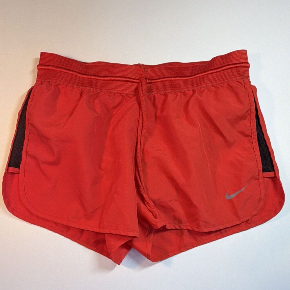 Nike Women’s reddish orange black Dri-FIT athletic running shorts